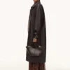 Langer Trenchcoat aus Kunstleder
