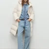 Langer, wattierter Anorak mit Kapuze Langer, wattierter Anorak mit Kapuze