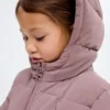 Langer, wattierter Anorak mit Kapuze Langer, wattierter Anorak mit Kapuze