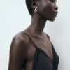 Langes Kleid mit Spitzendetails Langes Kleid mit Spitzendetails