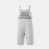 Latzhose mit gesticktem Besatz Latzhose mit gesticktem Besatz