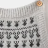 Latzhose mit gesticktem Besatz Latzhose mit gesticktem Besatz