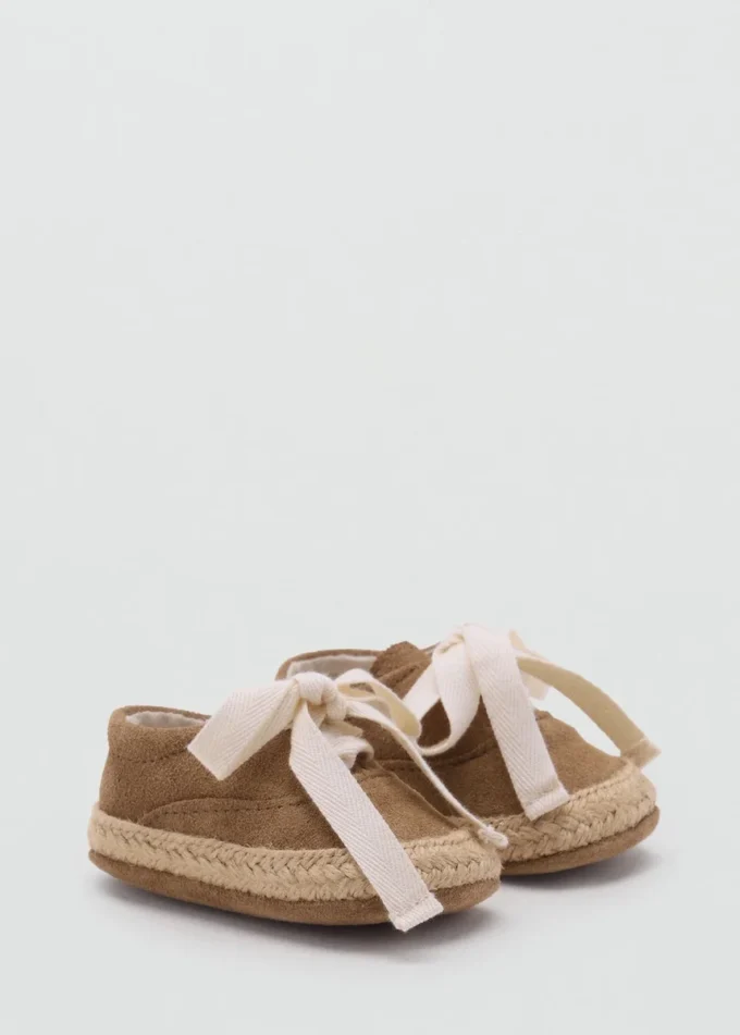 Leder-Schuh mit Schleife Leder-Schuh mit Schleife