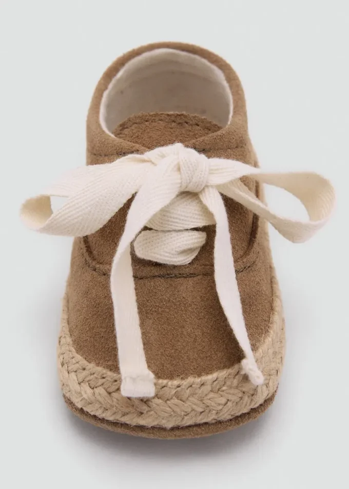 Leder-Schuh mit Schleife Leder-Schuh mit Schleife