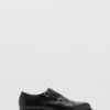 Lederschuhe mit doppelter Schnalle Lederschuhe mit doppelter Schnalle