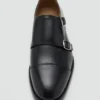 Lederschuhe mit doppelter Schnalle Lederschuhe mit doppelter Schnalle
