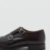 Lederschuhe mit doppelter Schnalle Lederschuhe mit doppelter Schnalle