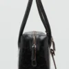 Lederschultertasche mit Anhängern