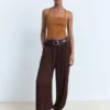 Lurex-Strickoberteil mit gekreuztem Rücken Lurex-Strickoberteil mit gekreuztem Rücken
