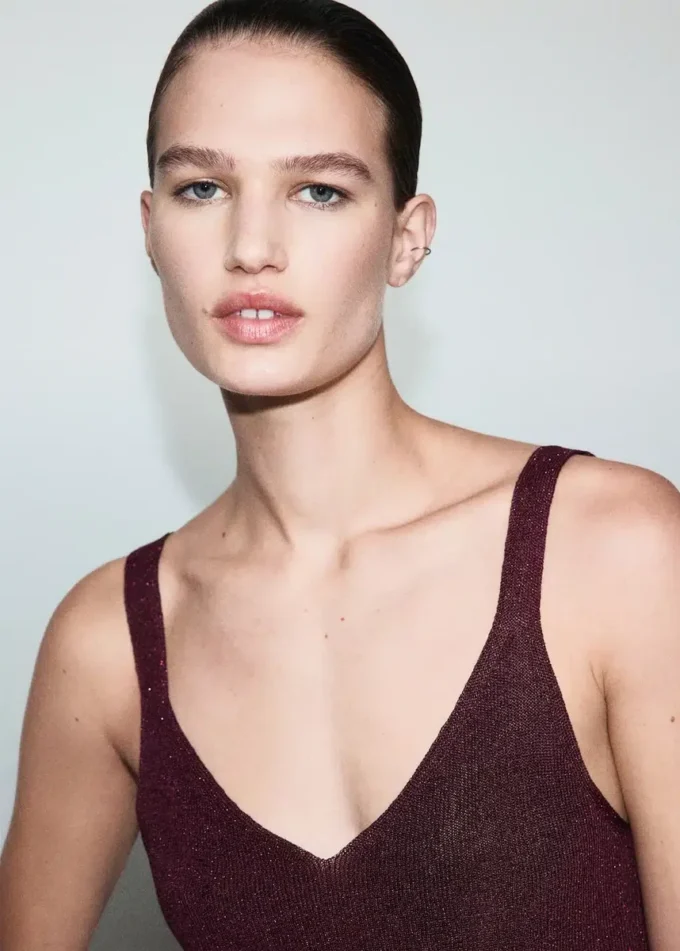 Lurex-Strickoberteil mit V-Ausschnitt Lurex-Strickoberteil mit V-Ausschnitt