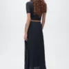 Lurex-Strickrock mit Falten Lurex-Strickrock mit Falten
