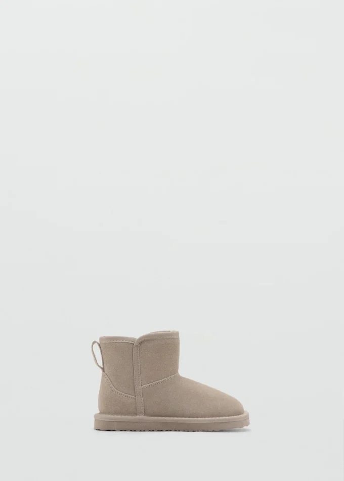 Mit Schaffell gefütterte Stiefeletten Mit Schaffell gefütterte Stiefeletten