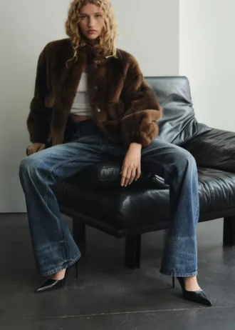Mittlere Leibhöhe, ausgestellte Jeans