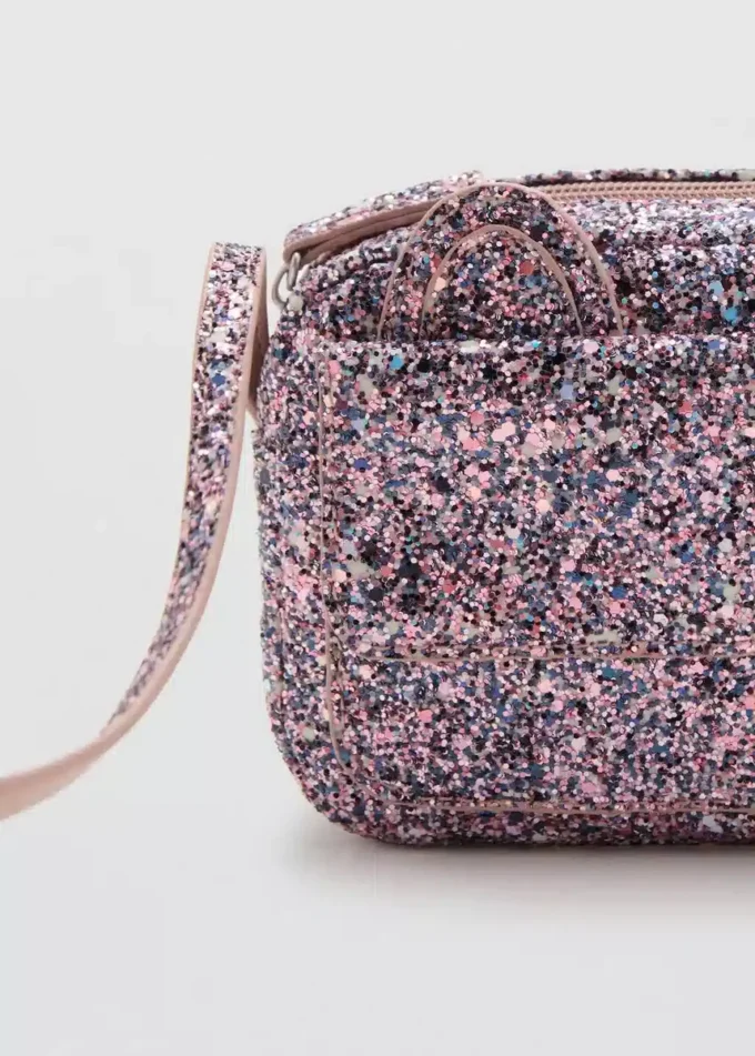 Ohrentasche mit Pailletten Ohrentasche mit Pailletten