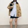 Oversized-Barnjacke mit kontrastierendem Kragen Oversized-Barnjacke mit kontrastierendem Kragen