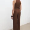 Plissierter Overall mit Gürtel Plissierter Overall mit Gürtel