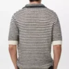 Polohemd aus 100 % Baumwolle mit gestreifter Struktur Polohemd aus 100 % Baumwolle mit gestreifter Struktur
