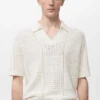Polohemd aus Baumwollstrick mit Spitzenmuster Polohemd aus Baumwollstrick mit Spitzenmuster