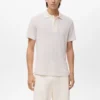 Polohemd aus Baumwollstrick mit Spitzenmuster Polohemd aus Baumwollstrick mit Spitzenmuster