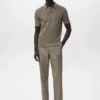 Polohemd aus Baumwollstrick mit Spitzenmuster Polohemd aus Baumwollstrick mit Spitzenmuster