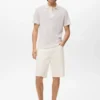 Polohemd aus Baumwollstrick mit Spitzenmuster Polohemd aus Baumwollstrick mit Spitzenmuster