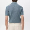 Polohemd aus Baumwollstrick mit Spitzenmuster Polohemd aus Baumwollstrick mit Spitzenmuster