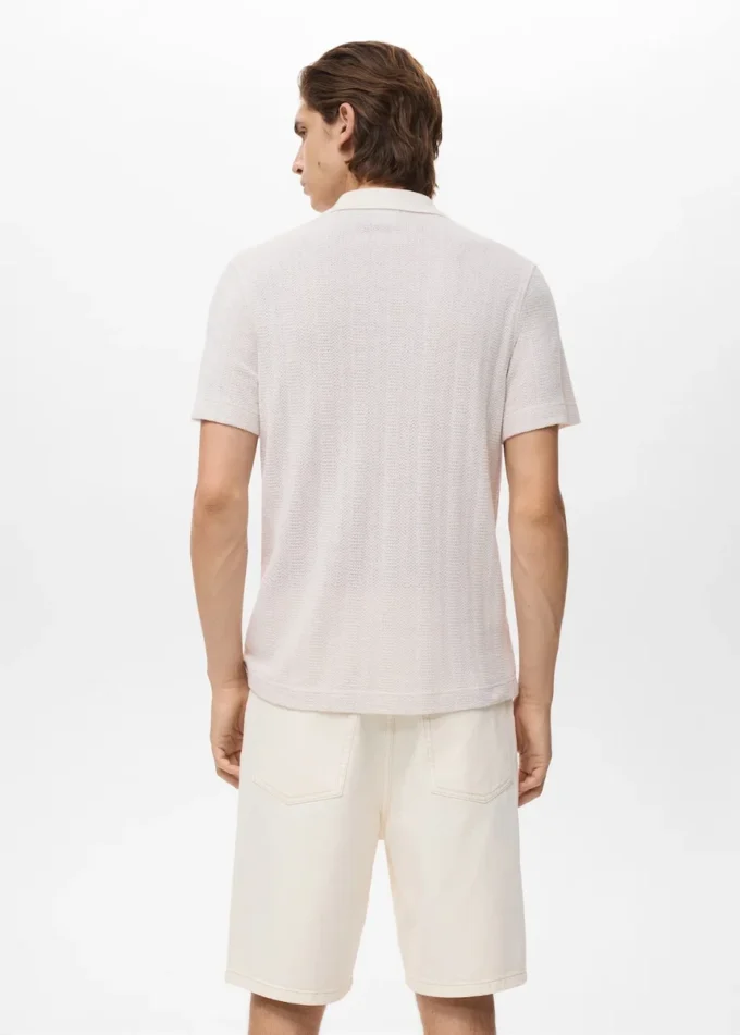 Polohemd aus Baumwollstrick mit Spitzenmuster Polohemd aus Baumwollstrick mit Spitzenmuster
