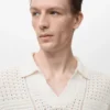 Polohemd aus Baumwollstrick mit Spitzenmuster Polohemd aus Baumwollstrick mit Spitzenmuster
