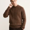 Pullover aus 100 % Wolle mit Zopfmuster Pullover aus 100 % Wolle mit Zopfmuster