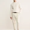 Pullover aus 100 % Wolle mit Zopfmuster Pullover aus 100 % Wolle mit Zopfmuster