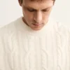 Pullover aus 100 % Wolle mit Zopfmuster Pullover aus 100 % Wolle mit Zopfmuster
