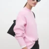 Pullover mit hohem Kragen Pullover mit hohem Kragen