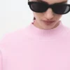 Pullover mit hohem Kragen Pullover mit hohem Kragen