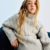 Rollkragenpullover aus Lurex
