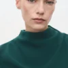 Rüschenkleid mit drapiertem Ausschnitt Rüschenkleid mit drapiertem Ausschnitt