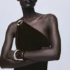 Samt-Jumpsuit mit Metallic-Details