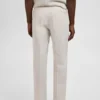 Schmal geschnittene Leinenhose mit Falten Schmal geschnittene Leinenhose mit Falten