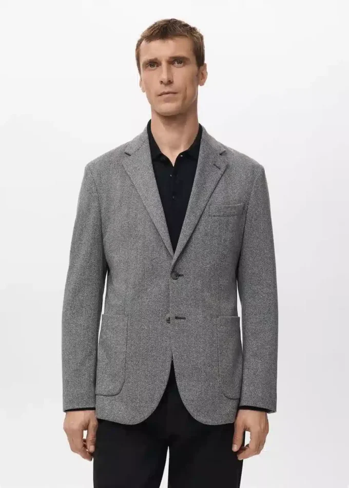Schmal geschnittene, taillierte Jacke mit Fischgrätenmuster Schmal geschnittene, taillierte Jacke mit Fischgrätenmuster