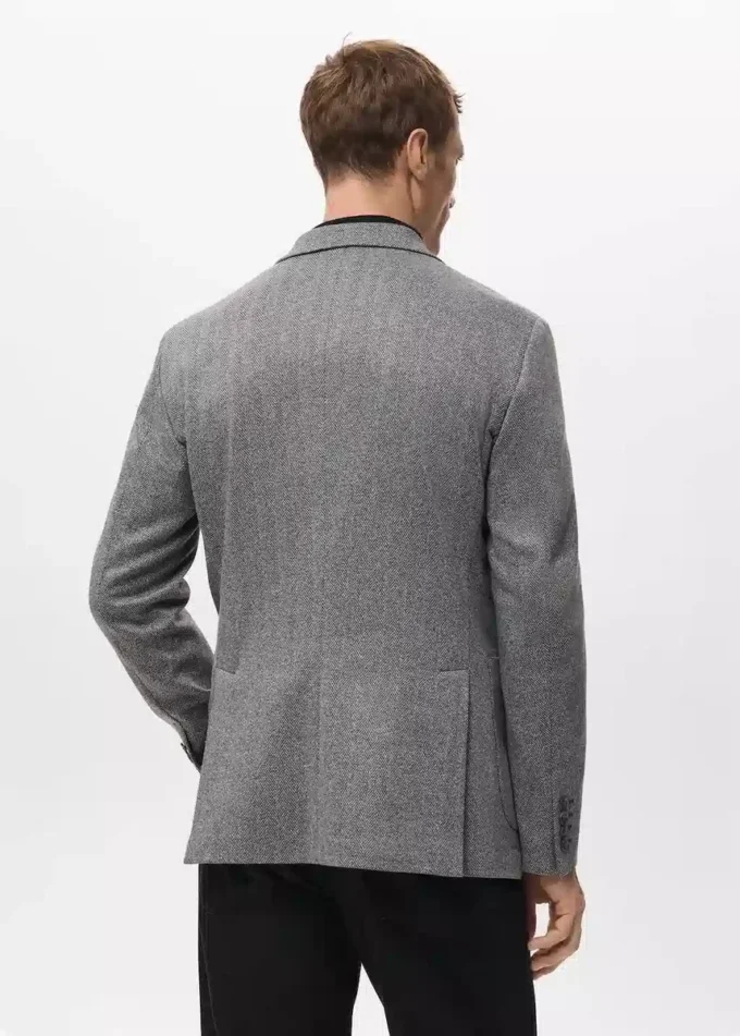 Schmal geschnittene, taillierte Jacke mit Fischgrätenmuster Schmal geschnittene, taillierte Jacke mit Fischgrätenmuster