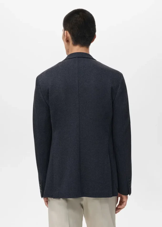 Schmal geschnittene, taillierte Jacke mit Fischgrätenmuster Schmal geschnittene, taillierte Jacke mit Fischgrätenmuster