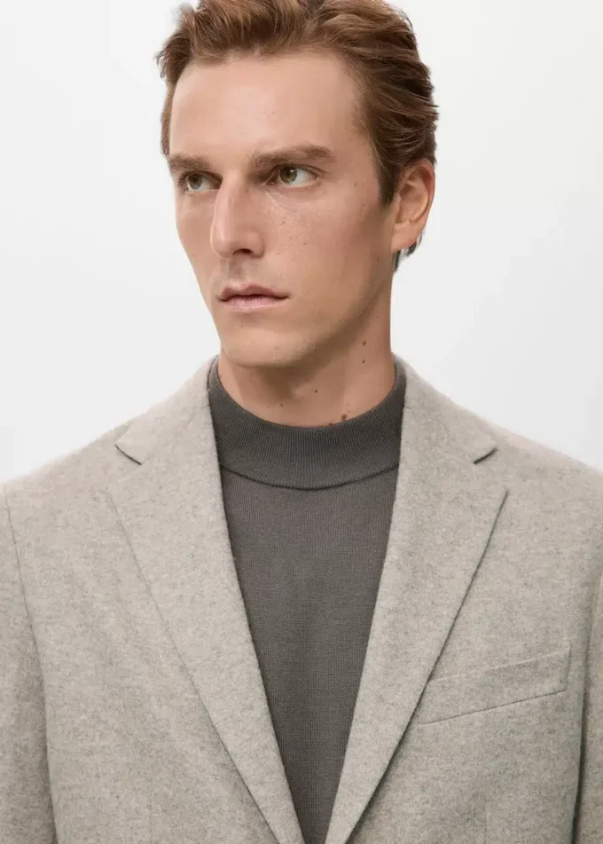 Schmal geschnittener Blazer aus melierter Wolle Schmal geschnittener Blazer aus melierter Wolle