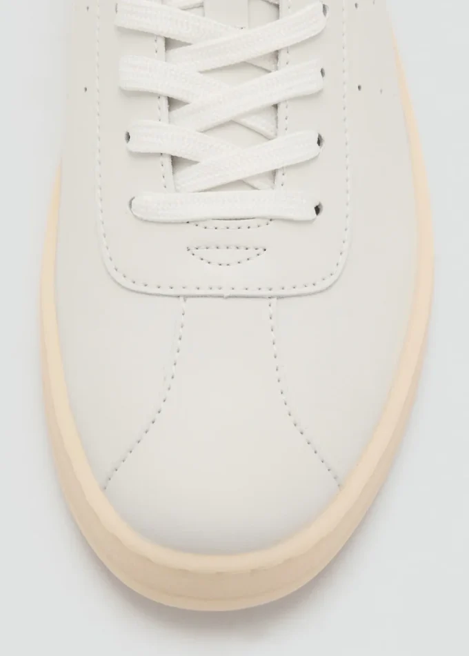 Sneaker mit Lederbesatz Sneaker mit Lederbesatz