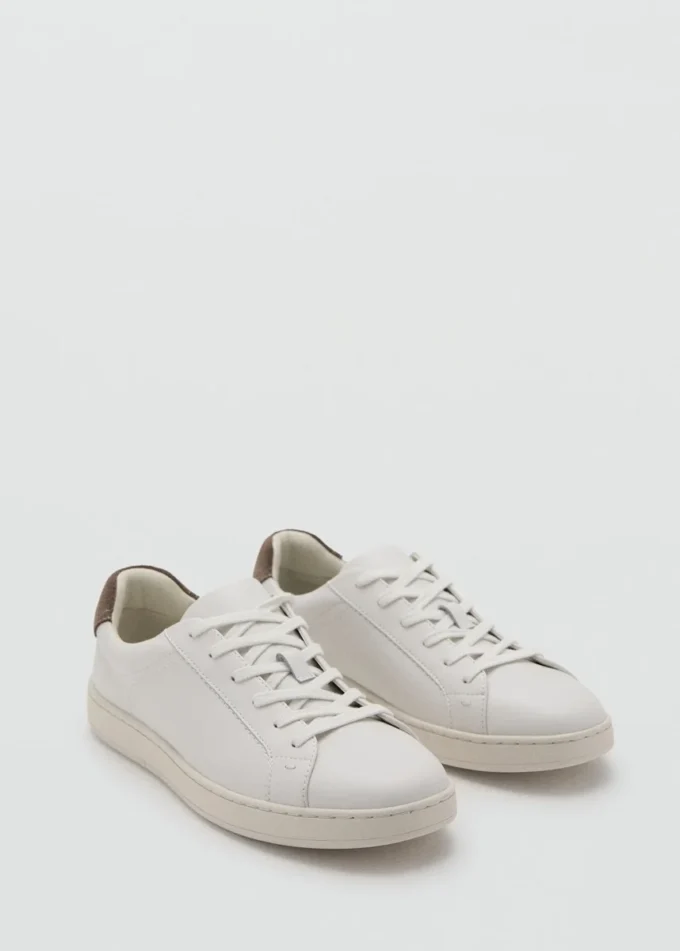 Sneakers mit kontrastierendem Lederbesatz Sneakers mit kontrastierendem Lederbesatz
