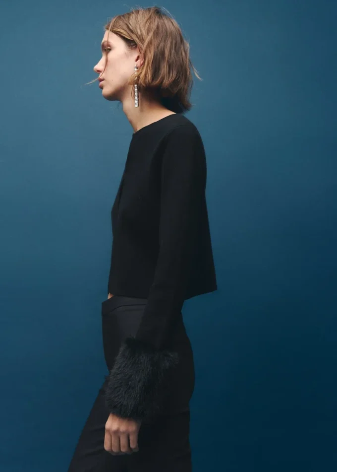 Strickjacke mit Kunstfellbündchen Strickjacke mit Kunstfellbündchen