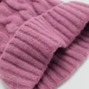 Strickmütze mit Bommel