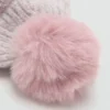 Strickmütze mit Bommel