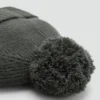 Strickmütze mit Ohrenschützern Strickmütze mit Ohrenschützern