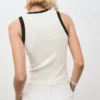 Strickoberteil mit kontrastierenden Paspeln Strickoberteil mit kontrastierenden Paspeln