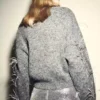 Strickpullover mit Federn