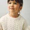 Strickpullover mit Rüschen